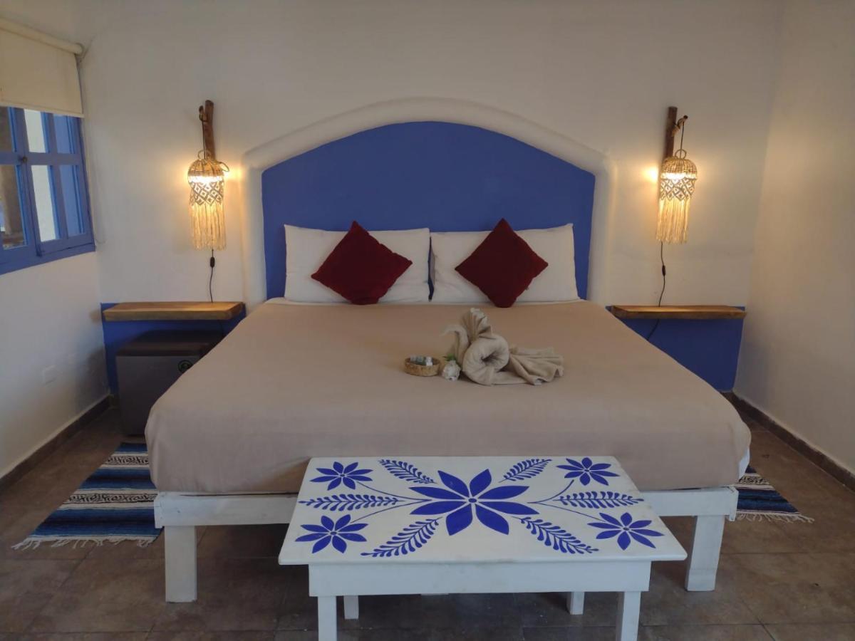 Mio Tulum Hotel Boutique Экстерьер фото A bedroom in a hotel in Santorini, Greece